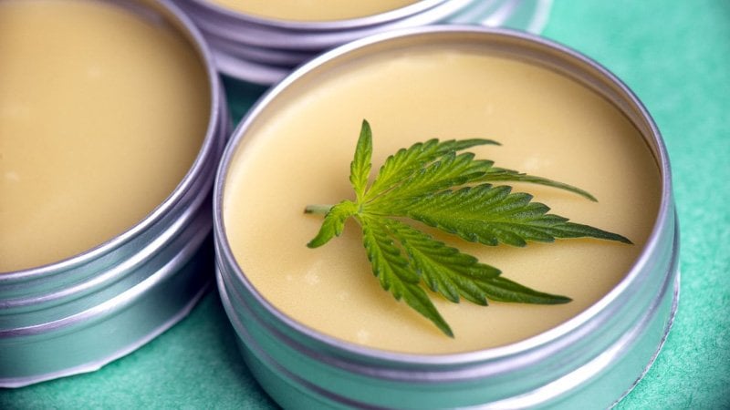 CBD salves and topicals with a hemp leaf