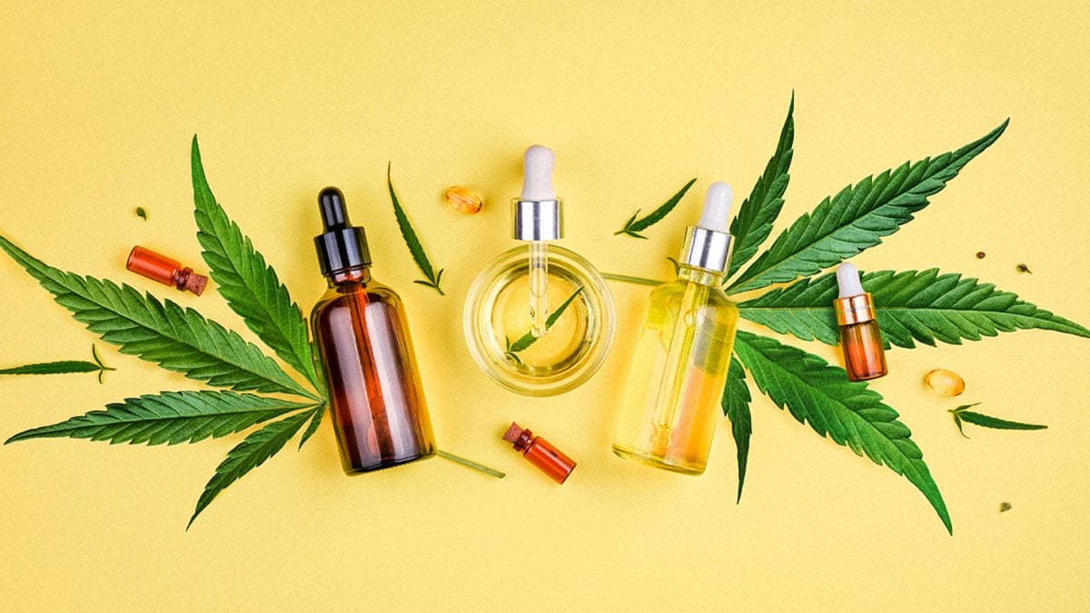 CBD oil vs. cbd capsules products on a yellow background